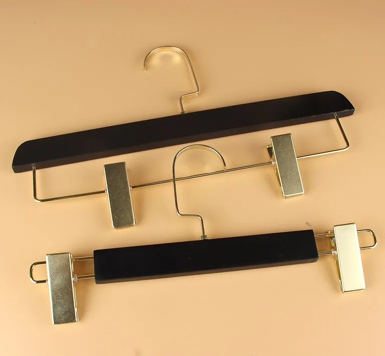 Customised Logo Clothes Wooden Non Slip Clip Coat Hanger Solid Wood Luxury Black Clothing Hanger with Gold Hooks
