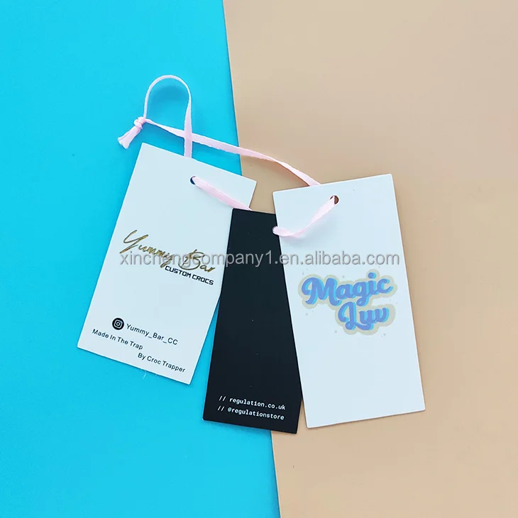 Luxury thick paper custom made garment hangtag swing hang tag rope Embossed label clothing accessories price tag
