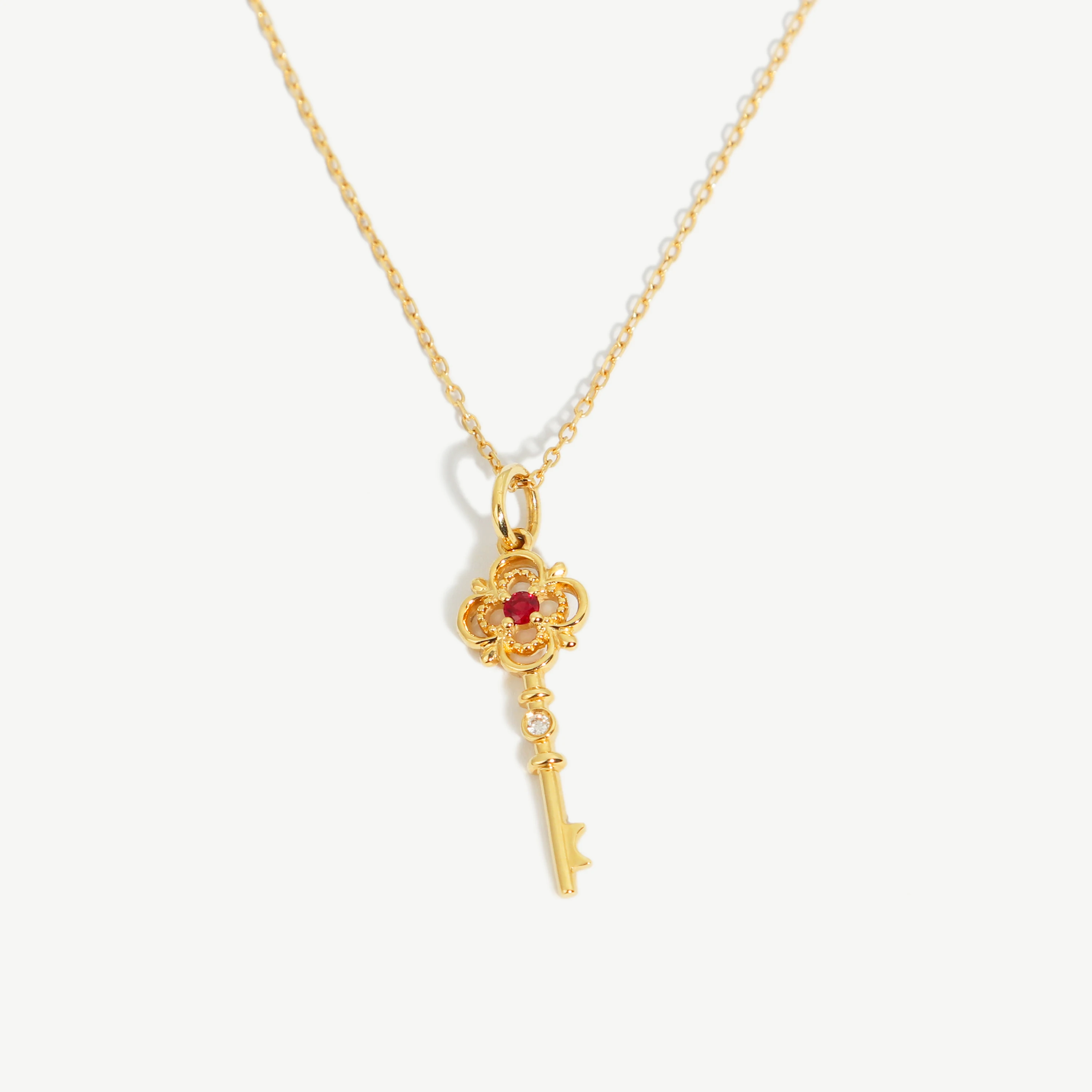 Chris April custom solid gold 18k 14k 9k diamond ruby key necklaces