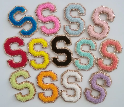 Embroidered letters with gold glitter background in variety chenille colors for bags and clothes