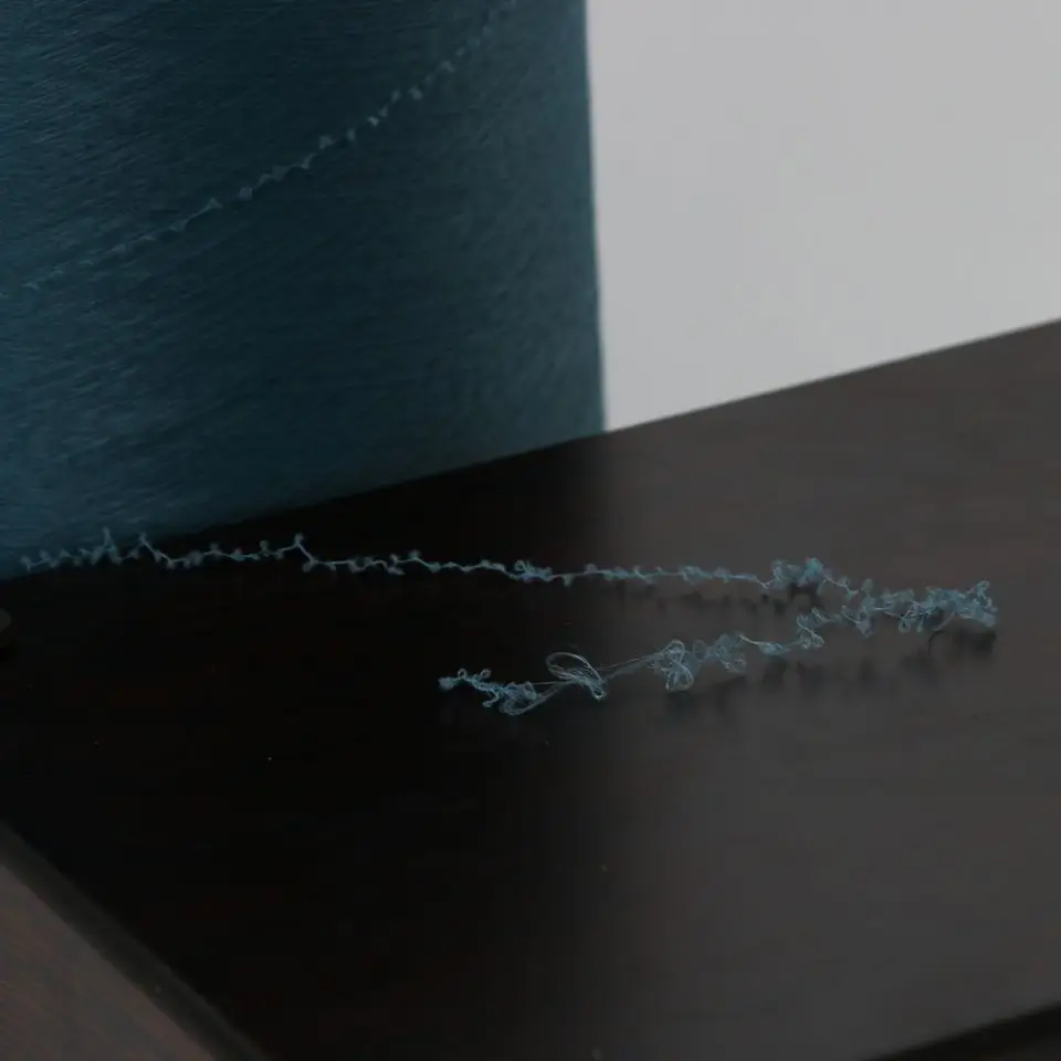 
High quality fabric polyester textured yarn low price spun polyester yarn 