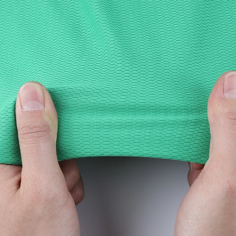 Spot 36s size Mitong mesh cloth 150g full polyester T-shirt sportswear bird eye mesh cloth quick drying fabric