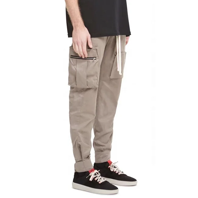 
Low moq street multi zipper pockets pencil pants solid color elastic drawstring jogger pants popular casual cargo pants stock 