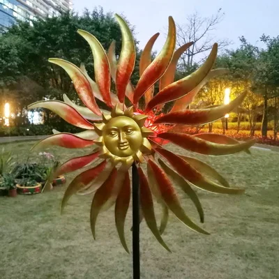 yard art metal sun face colour changing solar wind spinner spiral light