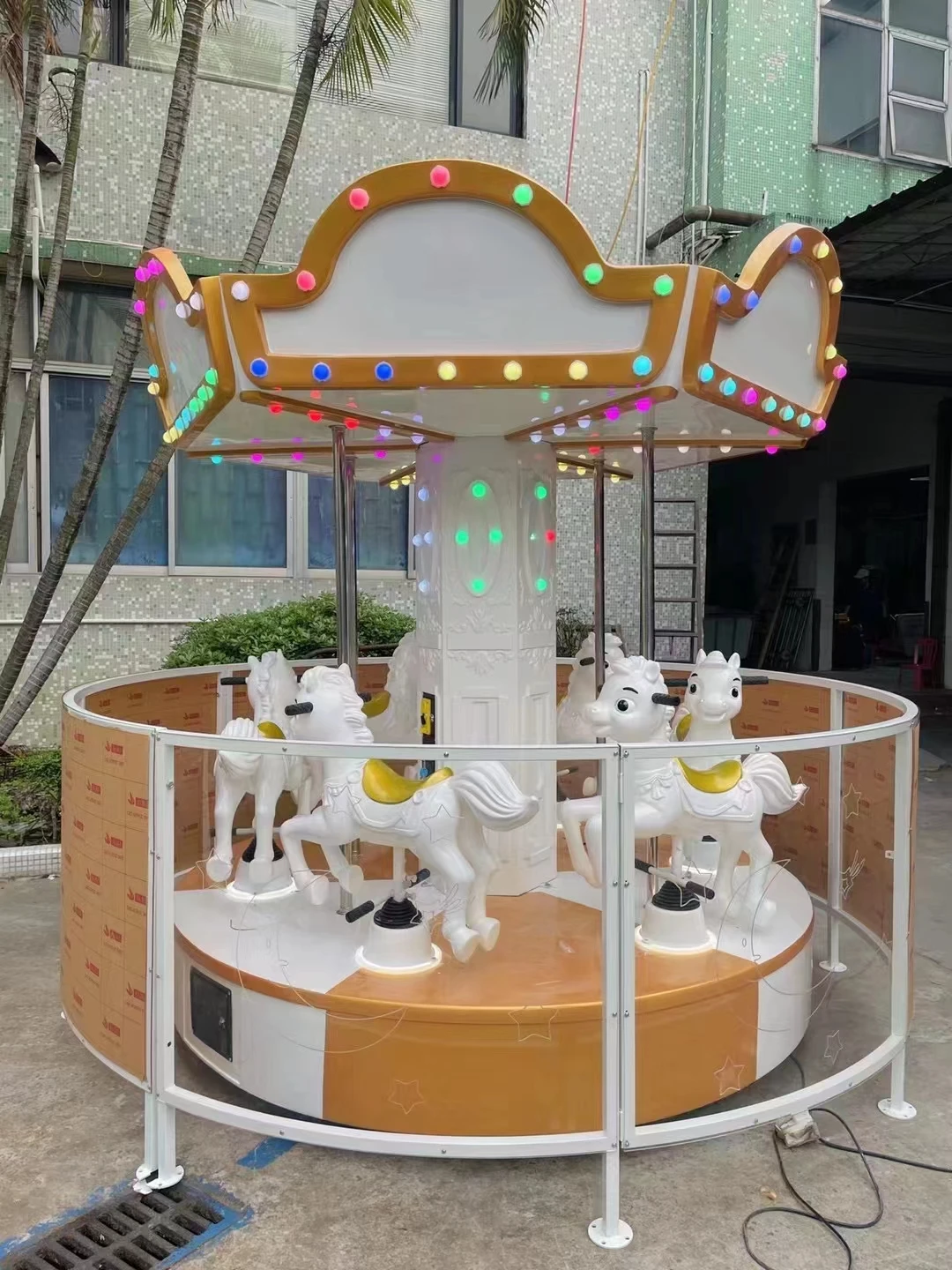 Coin operated three people horse carousel vintage kiddie ride game machine