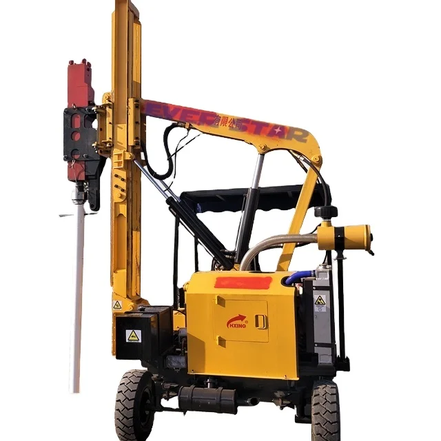 hydraulic pile driver and post hole digger for guardrail installation