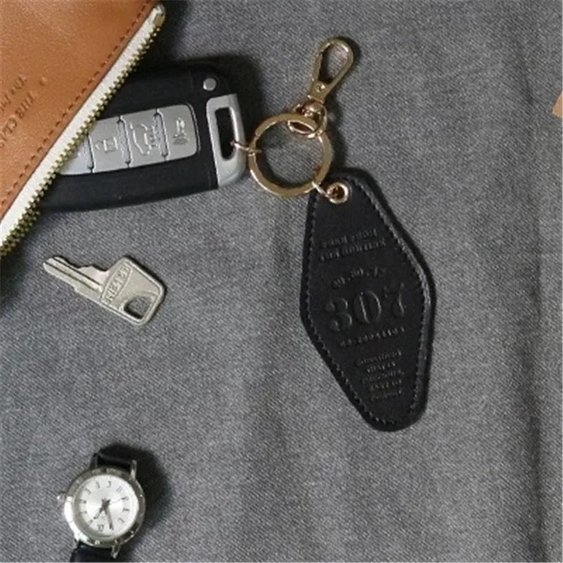 Wholesale Custom Embossed Logo Pure Color Hotel Keychain Blank PU Leather Hotel Room Keychain With Metal Hook Key Tags