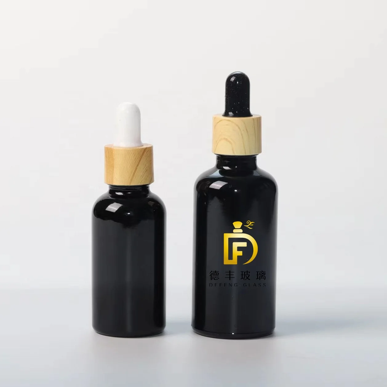 Wholesale Glossy Black Bottle Glass With Dropper For Skin Care Oil Packaging 30ml