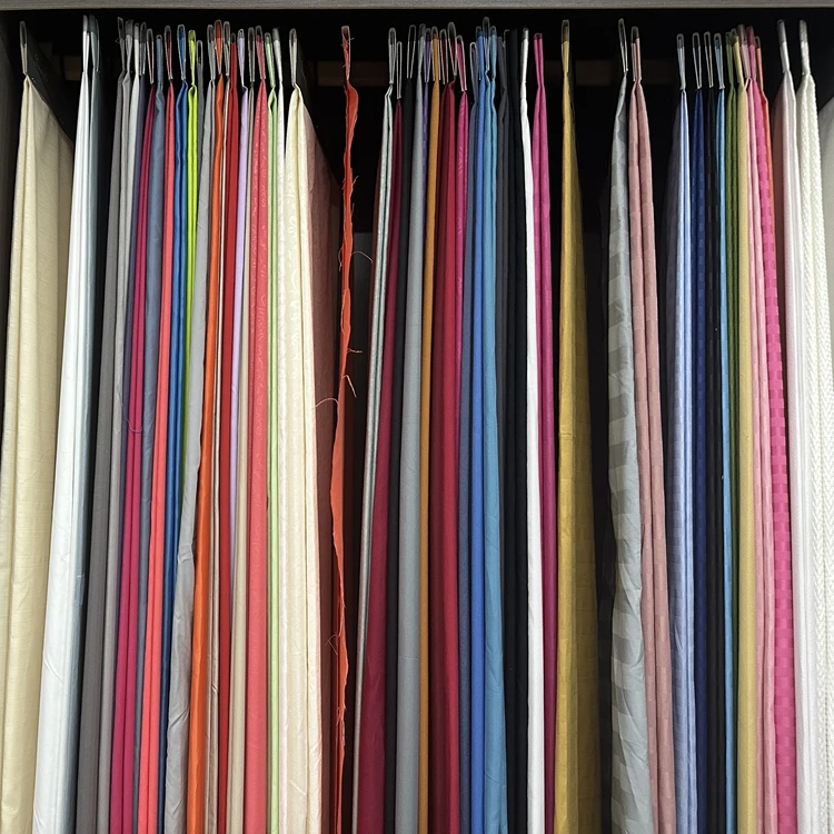 Manufacturer custom color solid dyed 100% polyester raw textile material microfiber peach skin fabric in roll