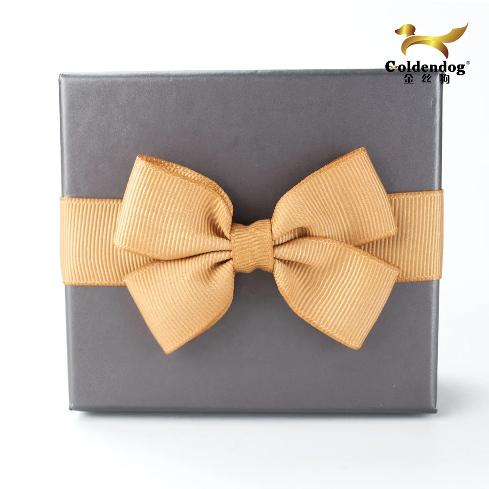 Pre-made grosgrain ribbon bow with elastic loop on back for packing decoration