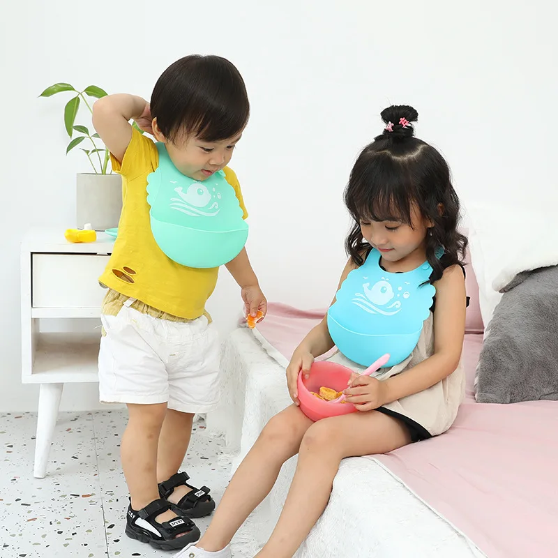 Manufacturers wholesale silicone baby baby meal bib super soft meal pocket children large saliva pocket wash-free