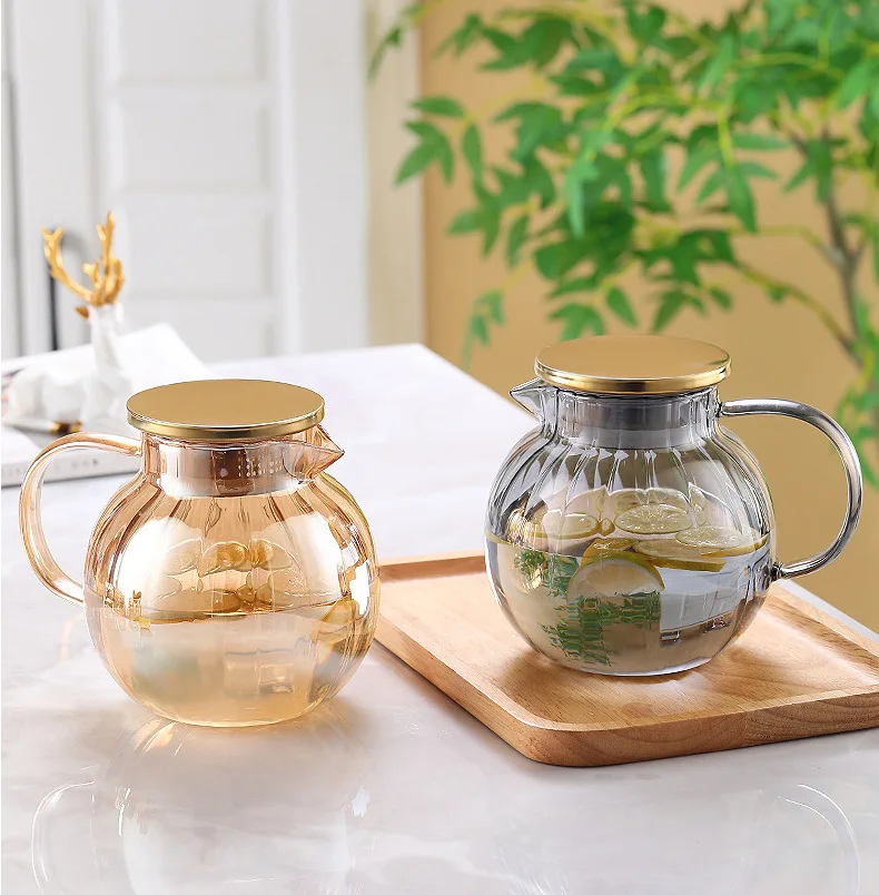 Hot sale household borosilicate glass 1300ml with lid stainless steel strainer juice glass teapot stovetop and microwave safe