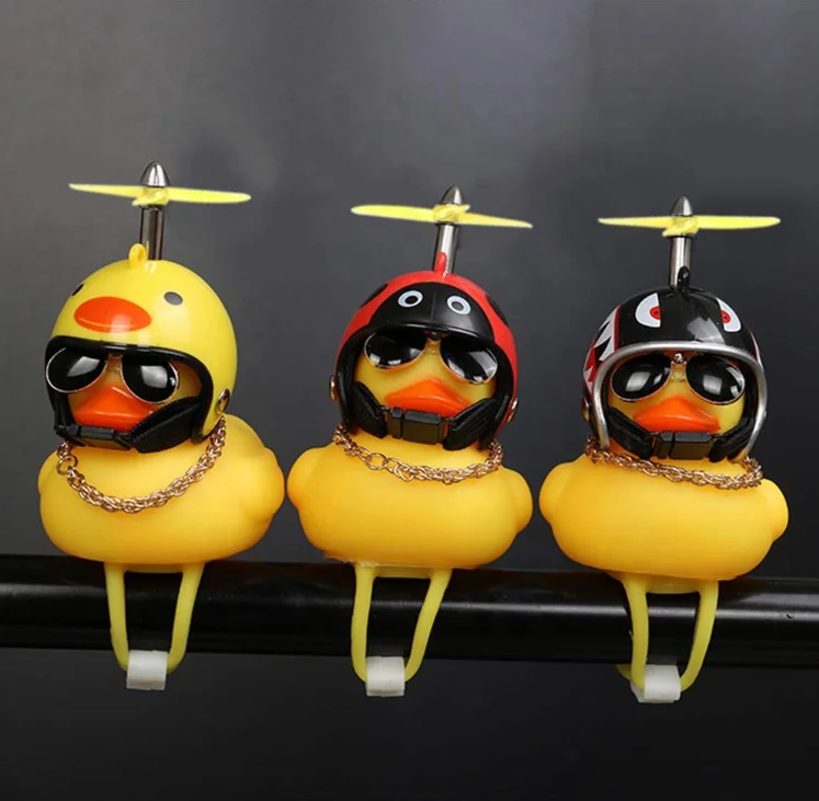 
Rubber Yellow Bike Duck Toy Car Dashboard Ornaments Decorations Squeeze Duck Bicycle Air Horn Light with Helmet and Rubber Band 