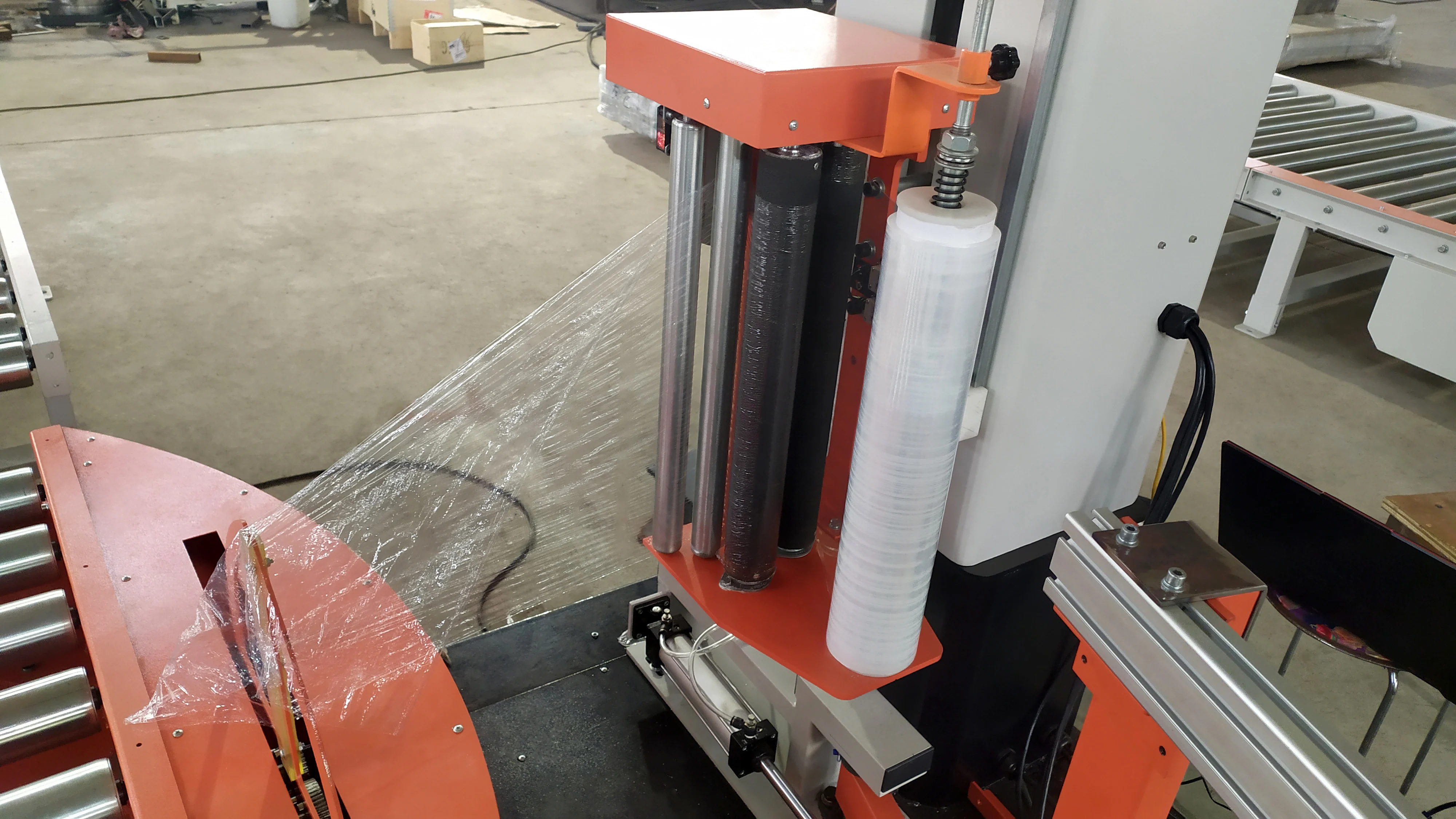 UCR-T2000A Conveyorized Automatic Turntable Pallet Stretch Wrapping Machine