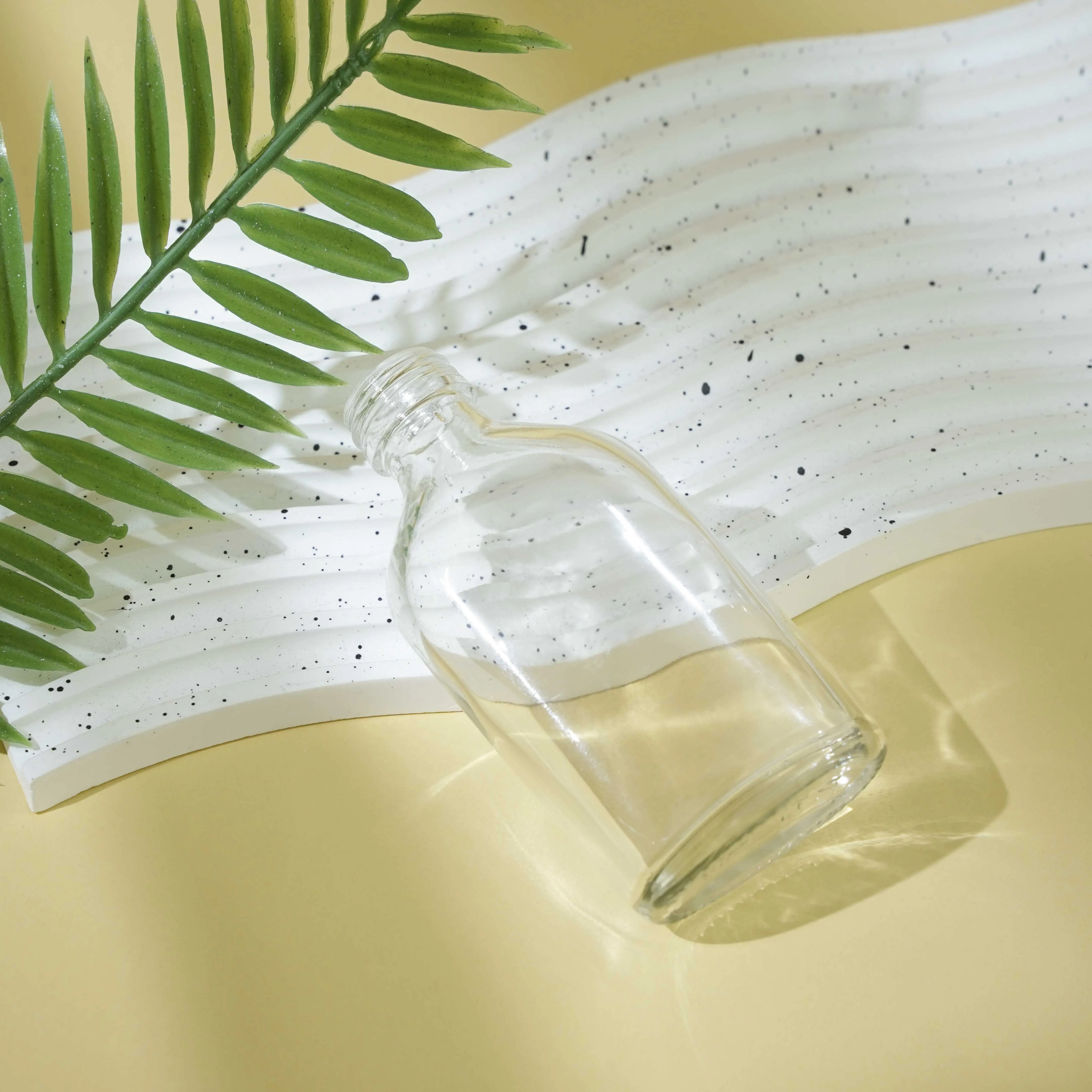 Berlin Packaging 50ml Small Liquor Sample Oval Juice Whiskey Spirit Bottle Vodka Water Glass Bottle For Carbonated Drinks