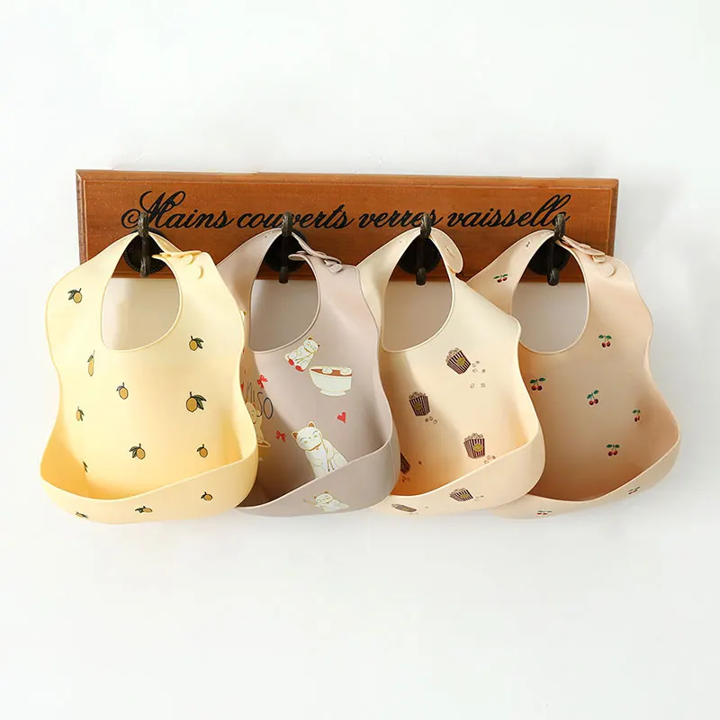 Bpa Free Waterproof Saliva Dripping Cartoon Newborn Feeding Soft Edible Aprons Adjustable Burp Scarf Silicone Baby Bib