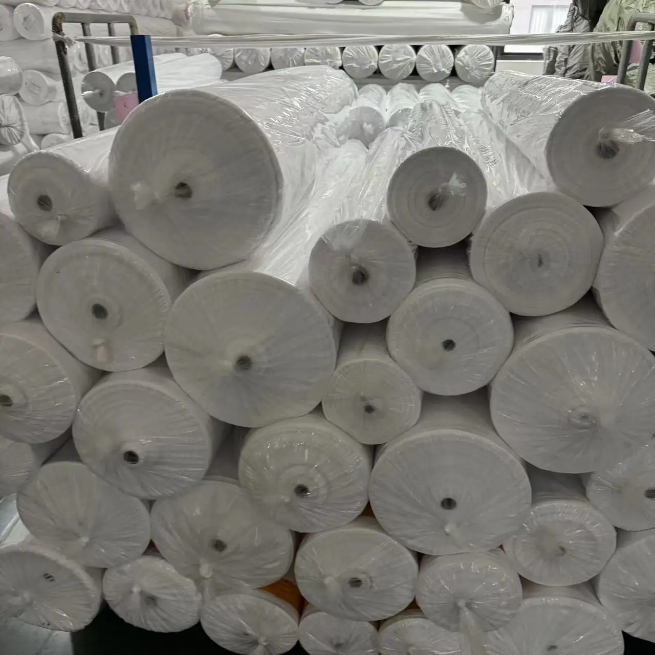Wholesale solid 100% polyester dyed plain woven microfiber fabric roll packing
