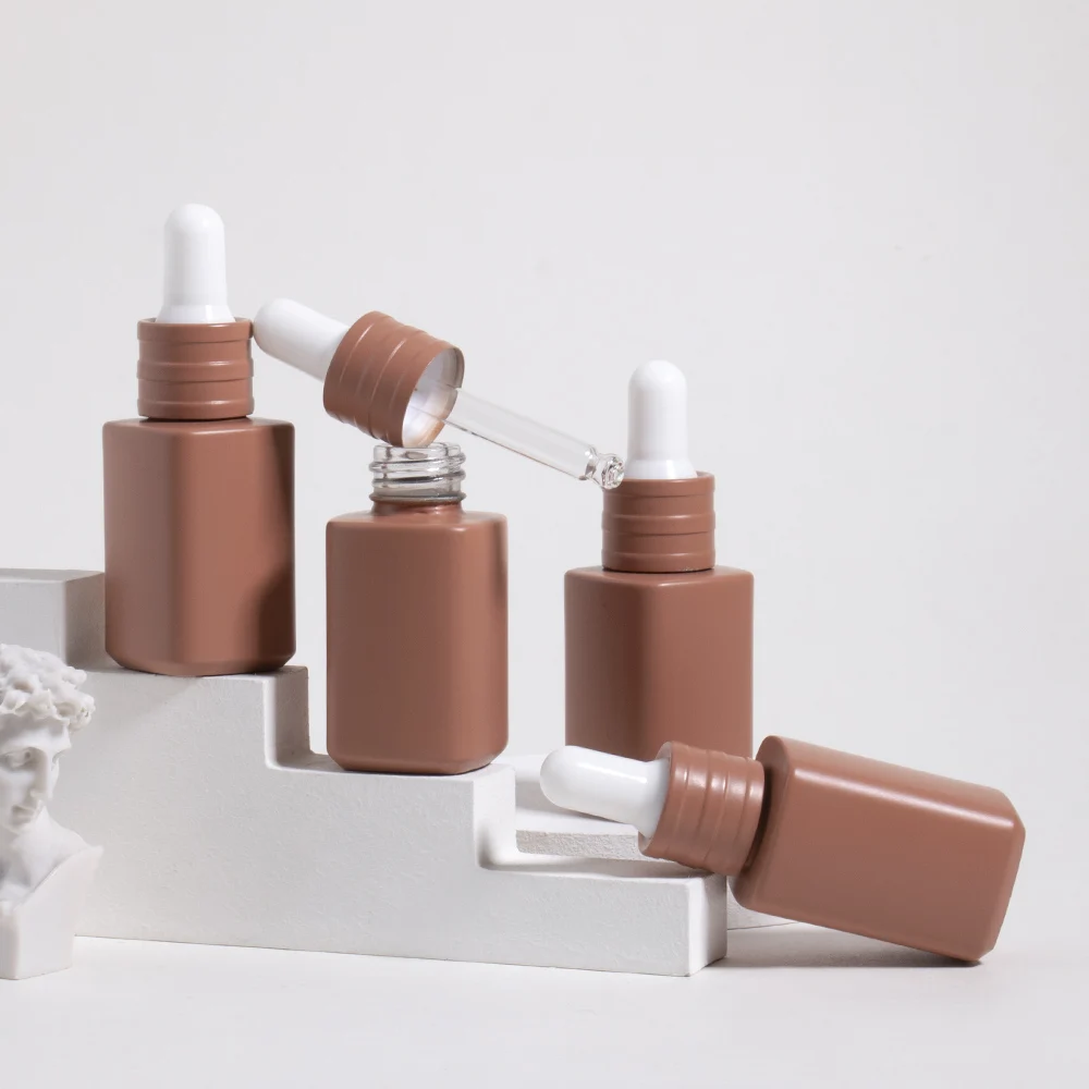 Custom transparent skin care cosmetics dropper 15ml 30ml coffee colored glass bottle square dropper bottle