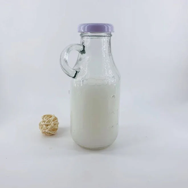 250ml clear vintage embossed glass milk juice bottle with small handle and scale line