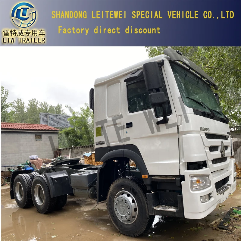 Sinotruck Rhd or LHD euro2  Diesel Engine 375HP Used HOWO sino cargo truck 6X4 Tractor Truck for sale