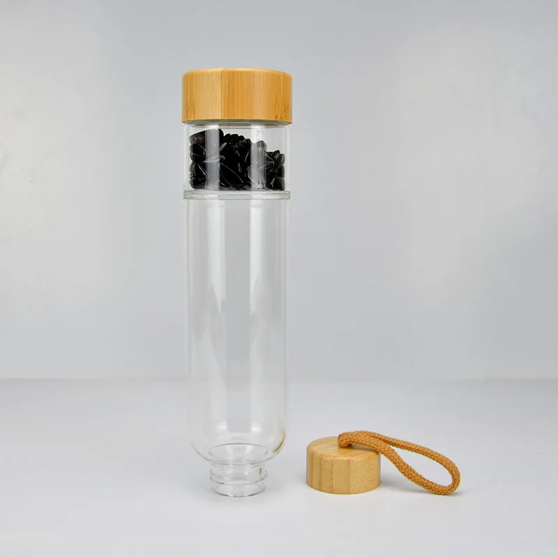 High Quality 17OZ Natural Crystal Infused Glass drink Water Bottle Bamboo Lid Gemstone Water Bottle With Crystal Inside