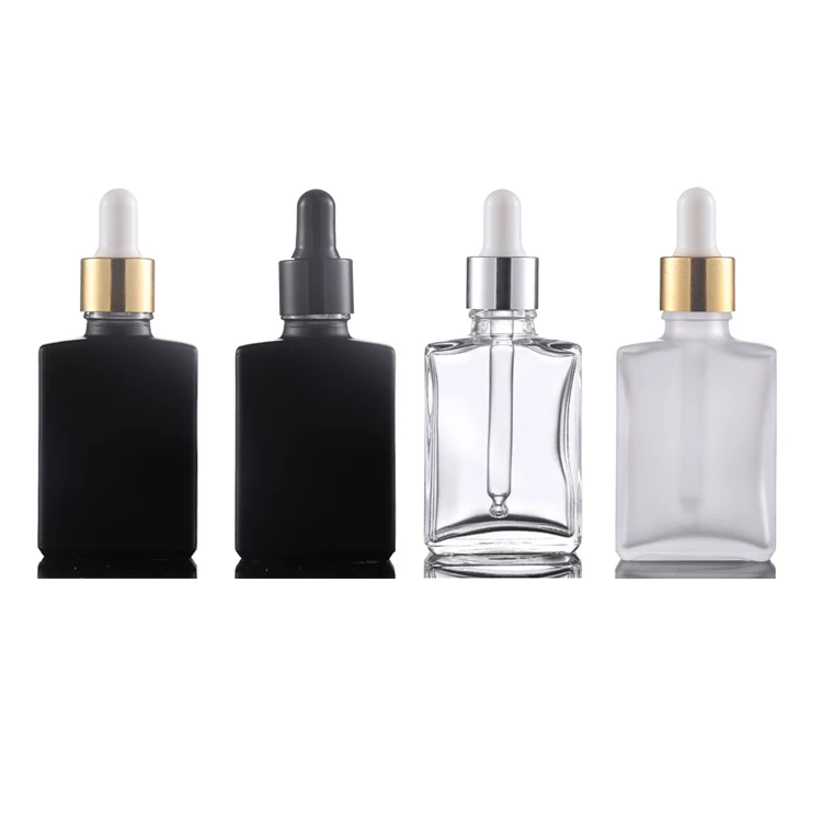 Matte black 30ml 50ml 100ml clear essential oil flat empty glass dropper bottles  frosted flat liquid glass bottle for cosmetic