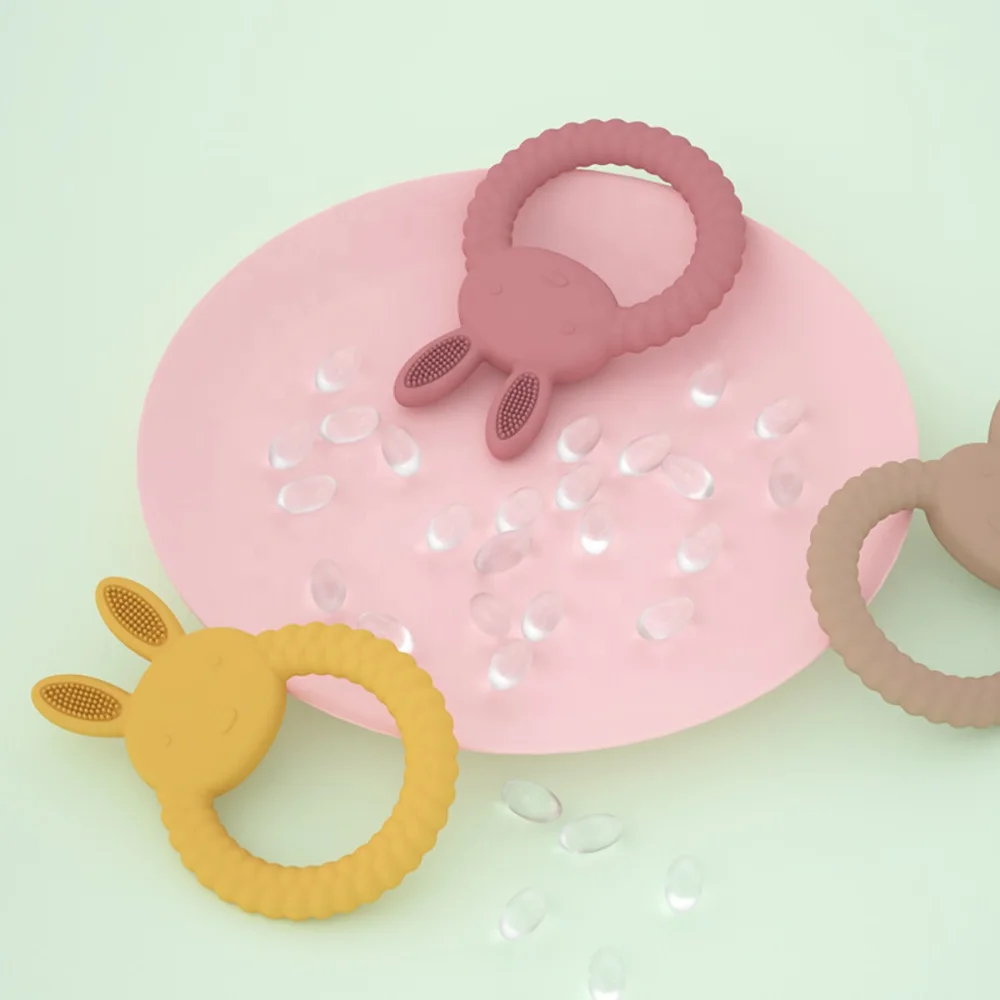 New Design OEM&ODM 0-24 months Buy Food Grade Infants Baby Chew Toys Rainbow Bunny Ring Silicone Teether Baby Teething