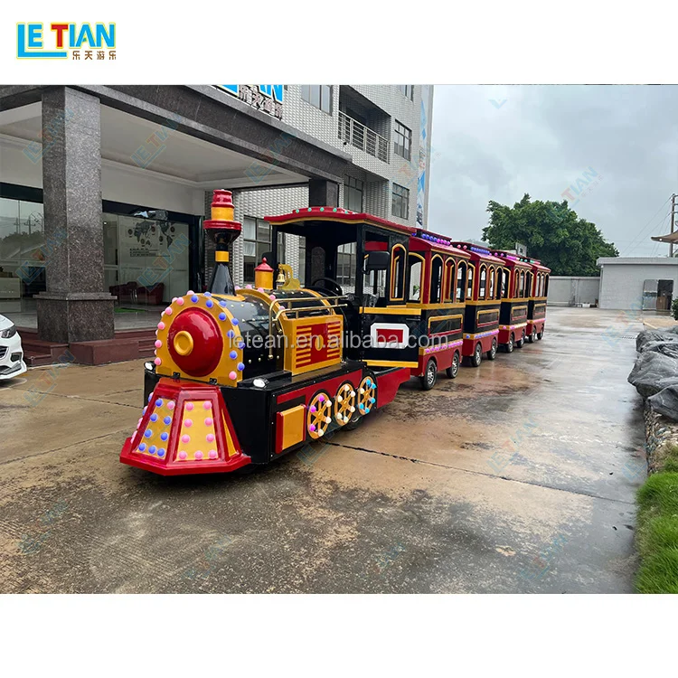 Outdoor public playground backyard kids locomotive train rides commercial shopping mall tourist trackless train
