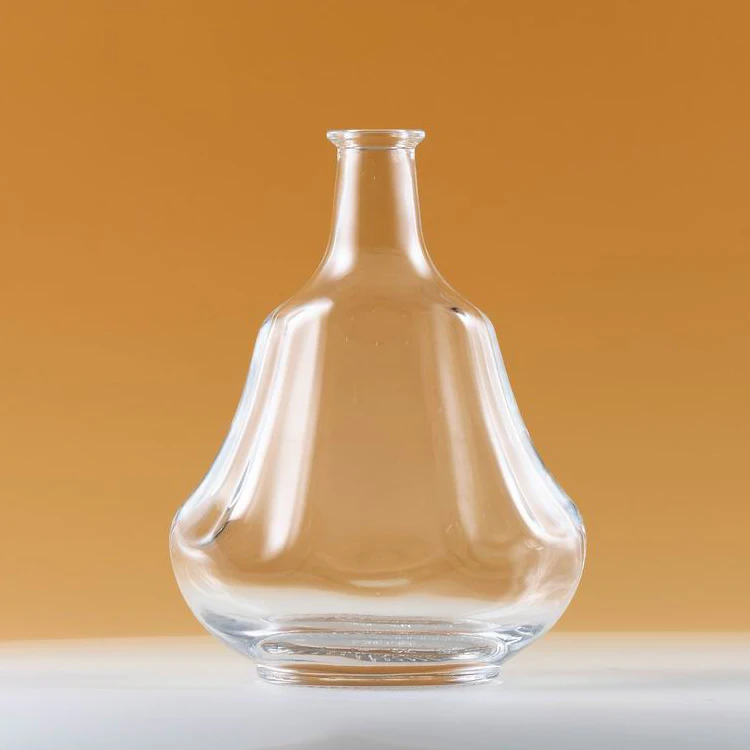 Wholesale high quality flat shape transparent glass bottle for brandy XO wine.
