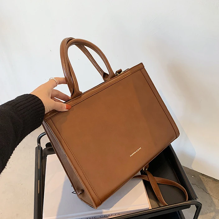 2022 New Arrivals Custom Leather Bags Medium Size Button Long Strap Work Tote Bag Women Hand Bags