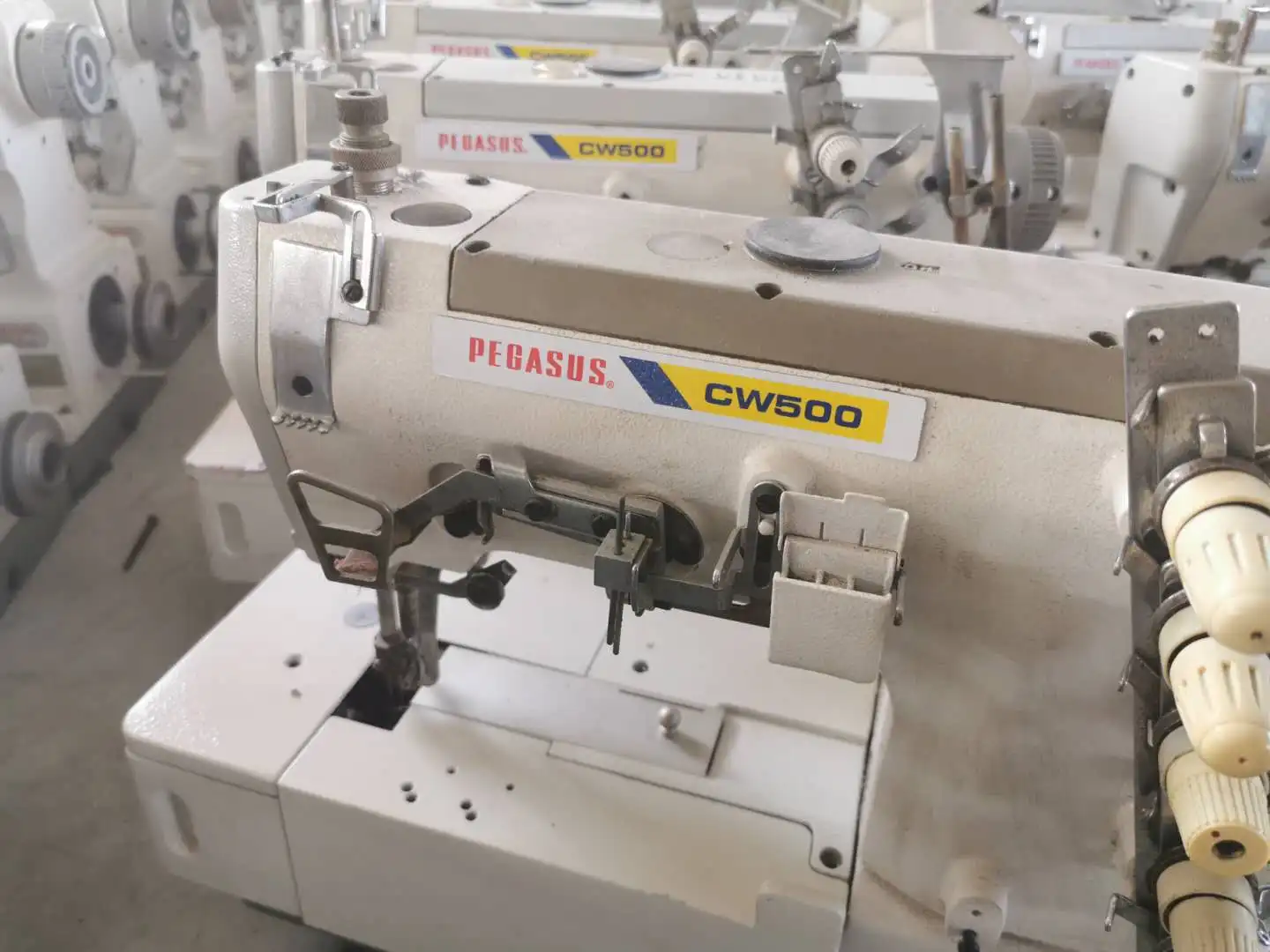 Used Pegasus W500 High Production Flatbed Interlock Stitch Industrial Sewing Machinery