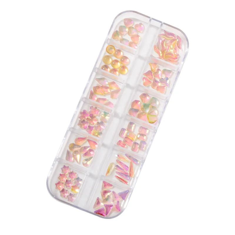 Wholesale 3d nail art crystal rhinestones 12 grid mixed ice transparent irregular shape flat bottom magic color shine DIY charms