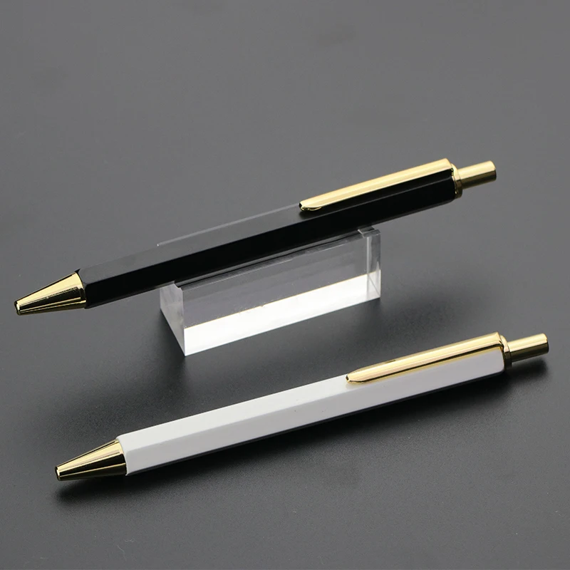 Custom logo projector hexagonal click metal ball pen wholesale products office advertising logo pen with gold trims