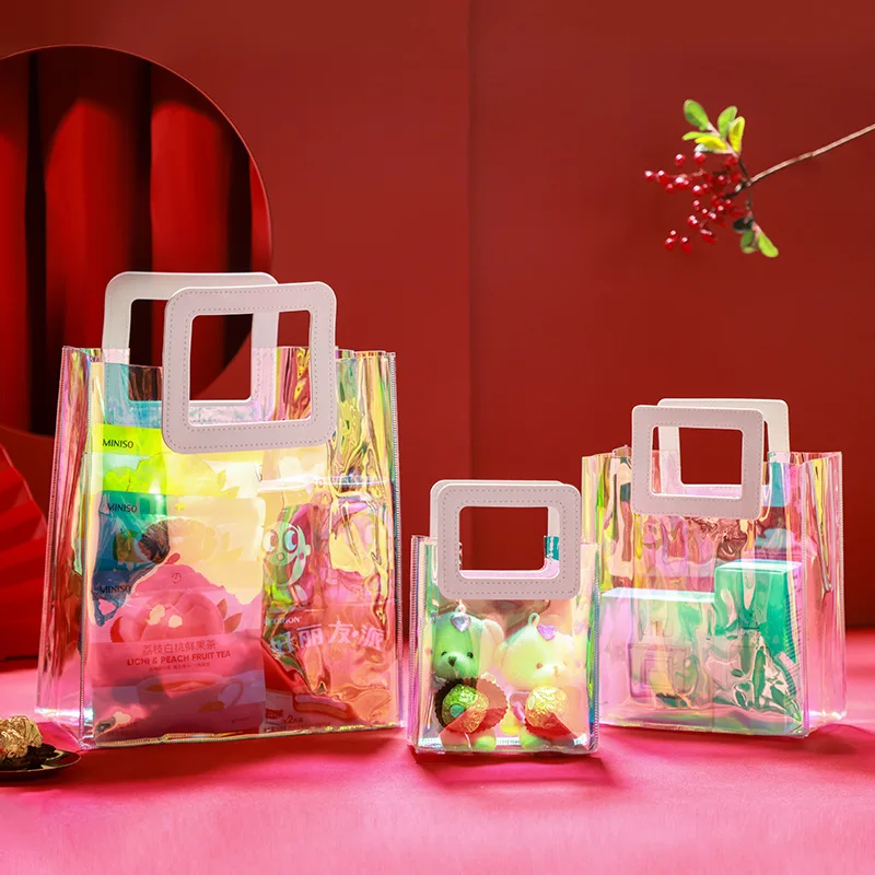 Luxury small plastic custom holographic shopping packaging christmas new year transparent bags for gifts wholesale with handle
