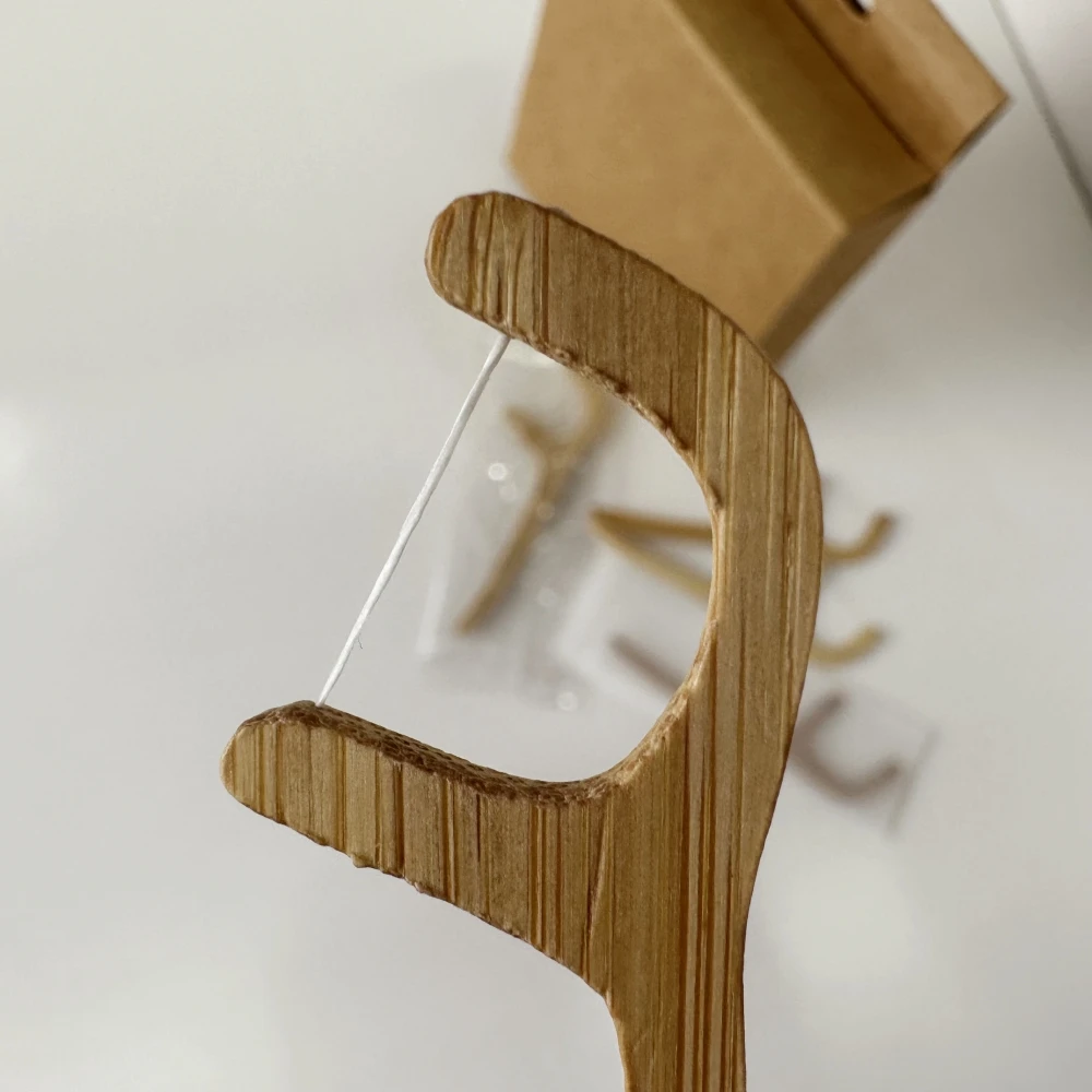 Biodegradable dental floss pick with OEM Logo packaging corn starch individually wrapped floss picks