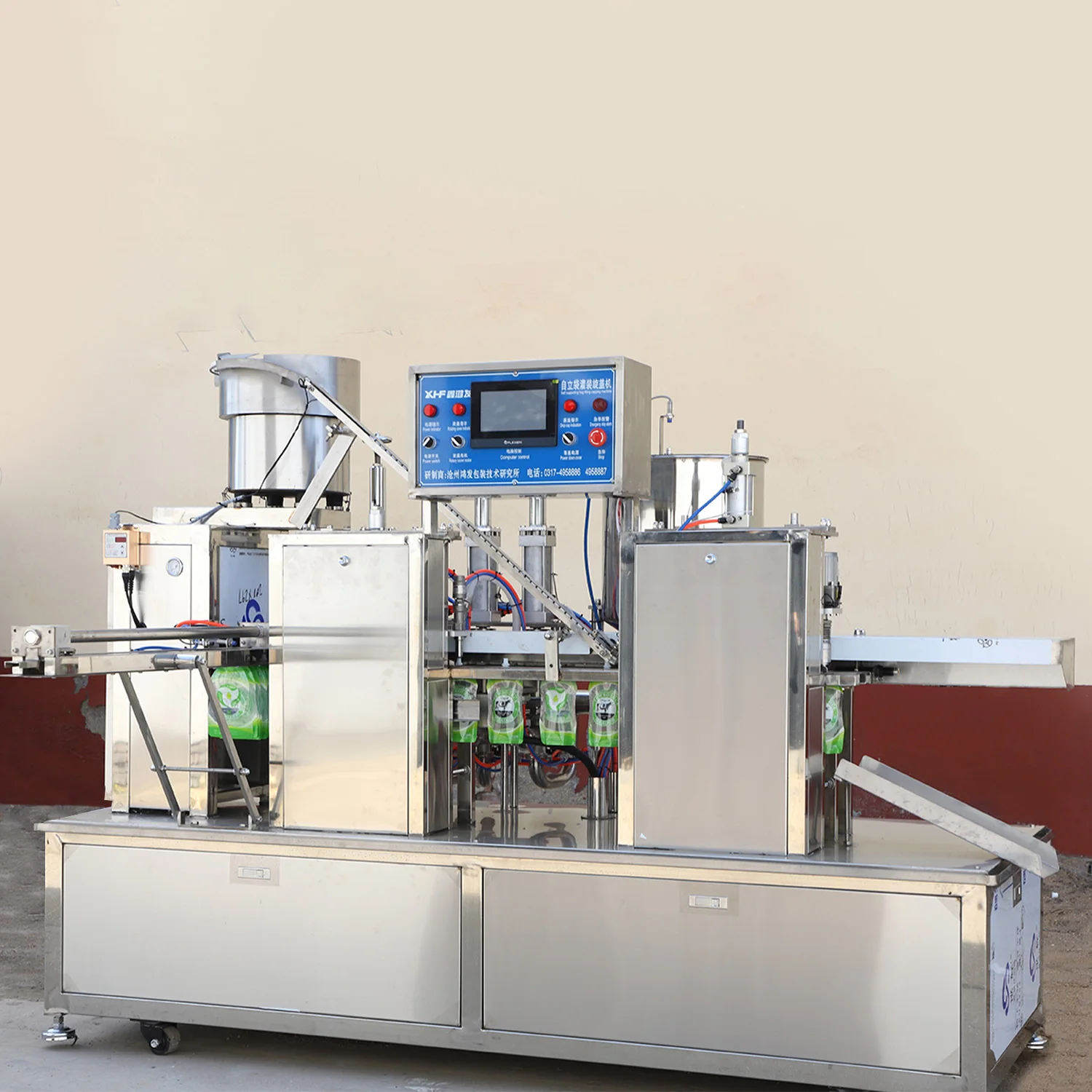 Full automatic 4 nozzle standing pouch juice soy milk plastic bag filling packaging machine factory juice filling equipment