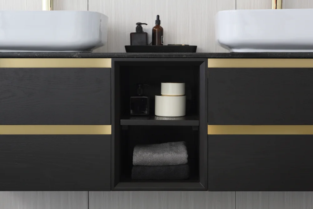 Double sink bathroom vanity with gold hardware