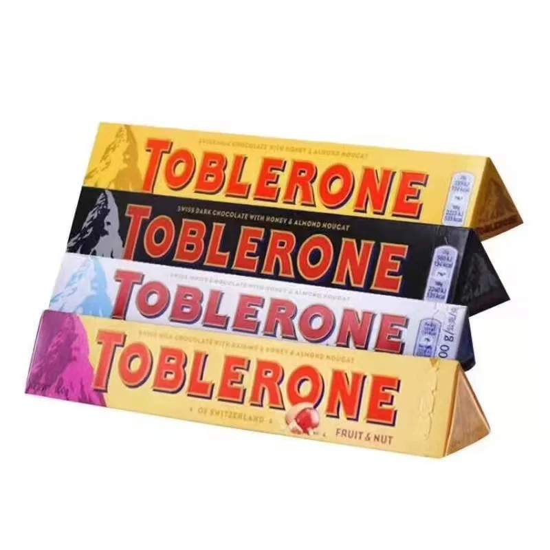 Tobleron Швейцарский треугольник темный шоколад изюм молочный белый 100 г