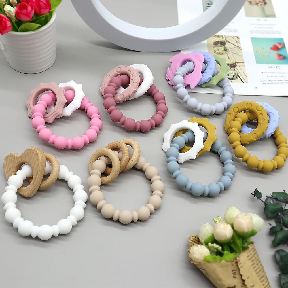 Wholesale Sensory Food Grade Infant Kids Wood Ring Wrist Never Drop Teething Glove Chew Silicone Baby Toys Teether