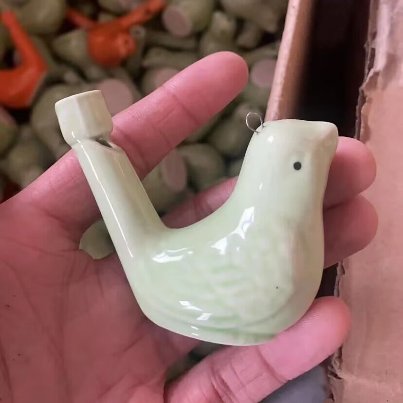 Wholesale cheap solid color bird whistle toy with lanyard omagic clay bird whistle