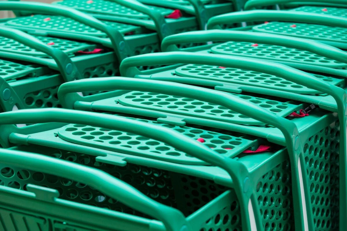 New product hand pushing commercial convenience trolley supermarket shopping cart