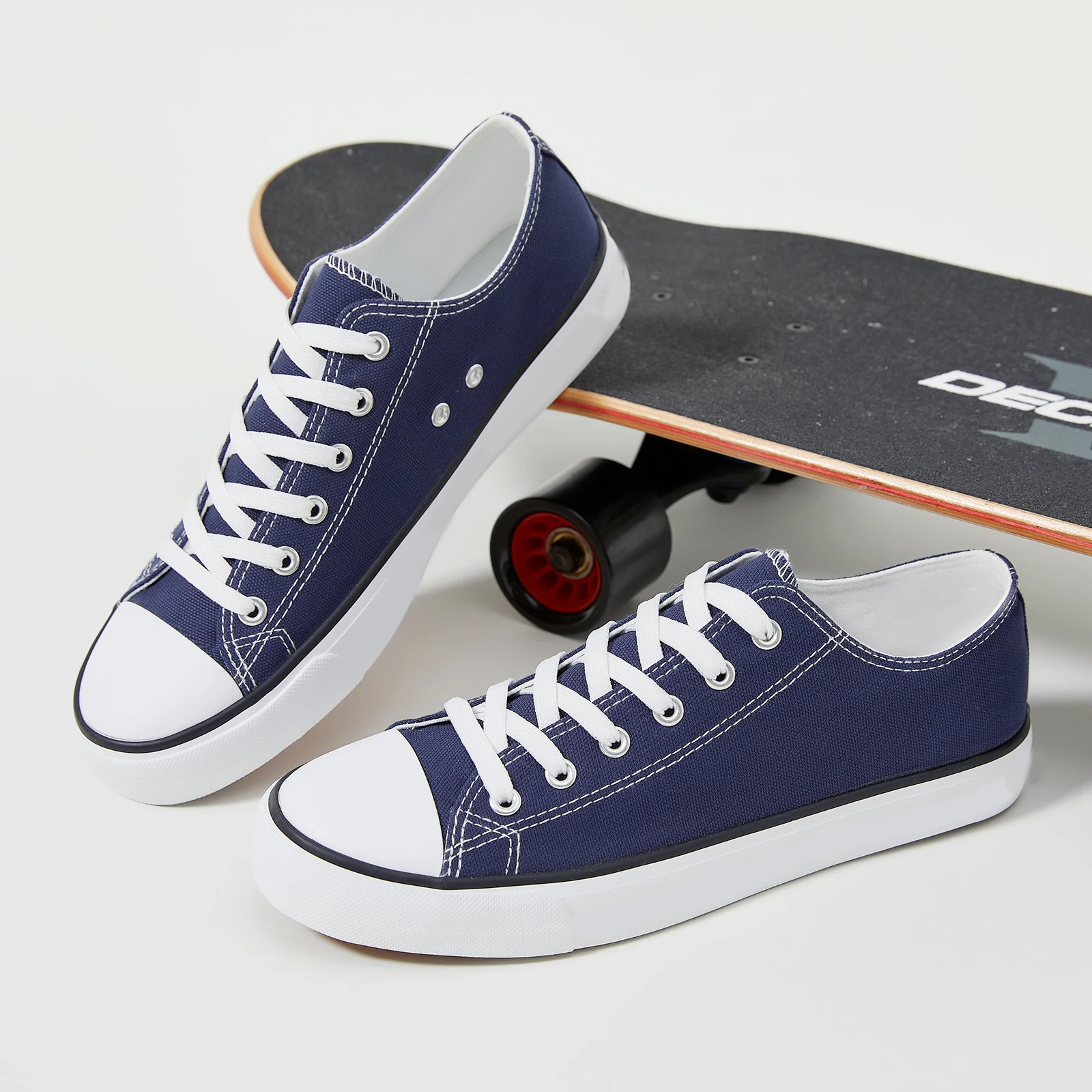 Factory wholesale solid color canvas shoes fashion custom casual shoes non-slip comfortable walking shoes for men and women