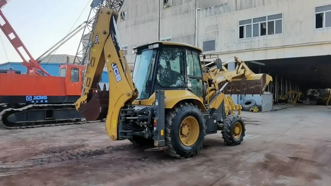Б/у экскаватор-погрузчик J-CB 4CX на