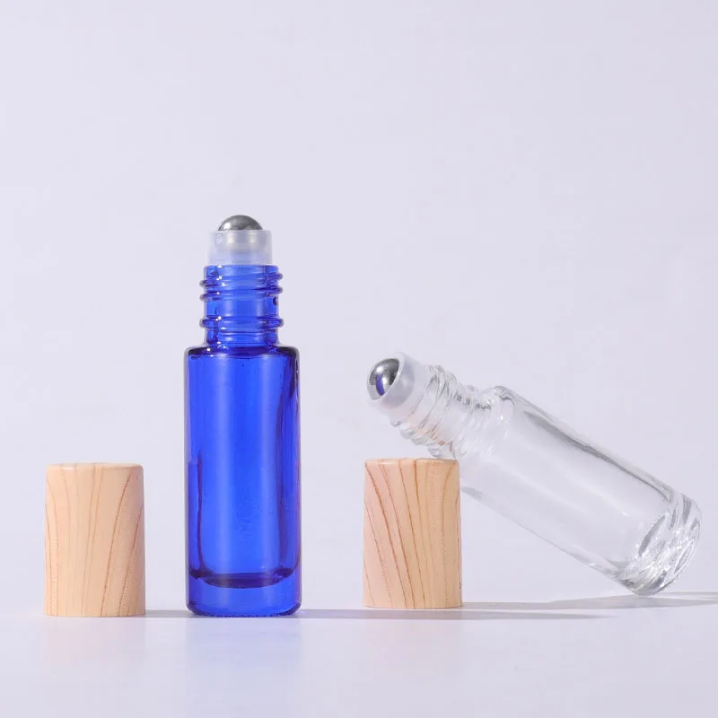 Wholesale Empty Essential Oil Perfume 4ml 5ml 8ml 10ml Frosted Clear Amber Blue Glass Roll On Bottle With Metal Roller Ball