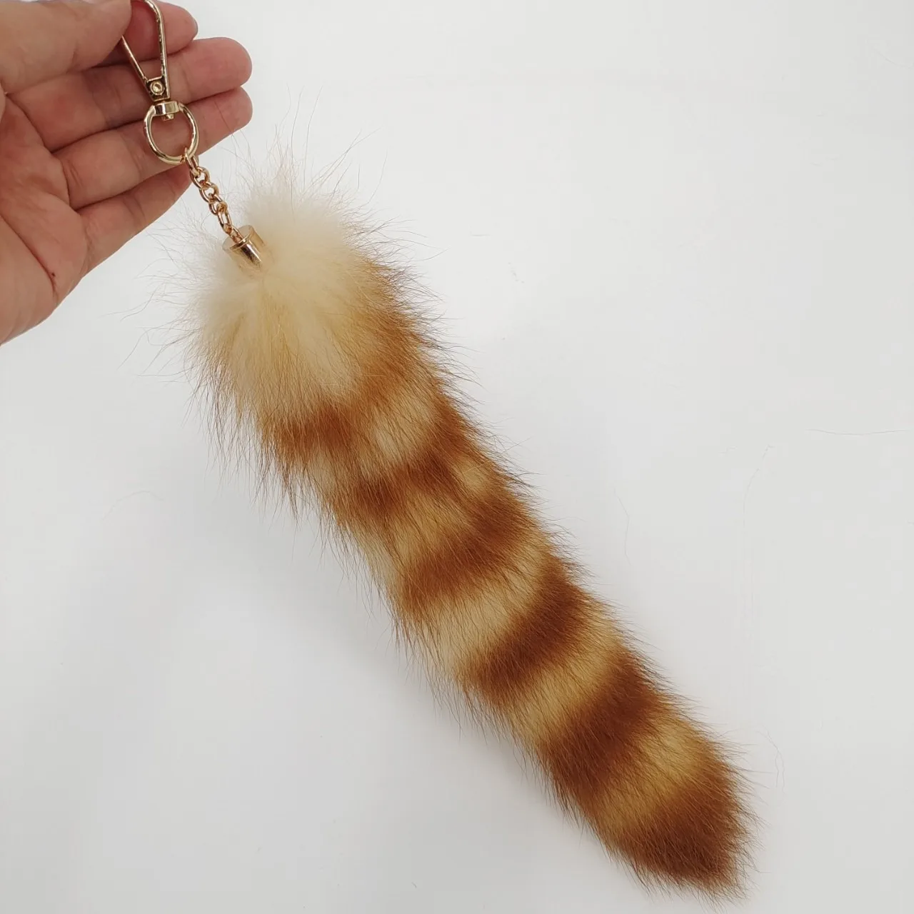 Заводской пушистый брелок из натурального меха енота и лисы