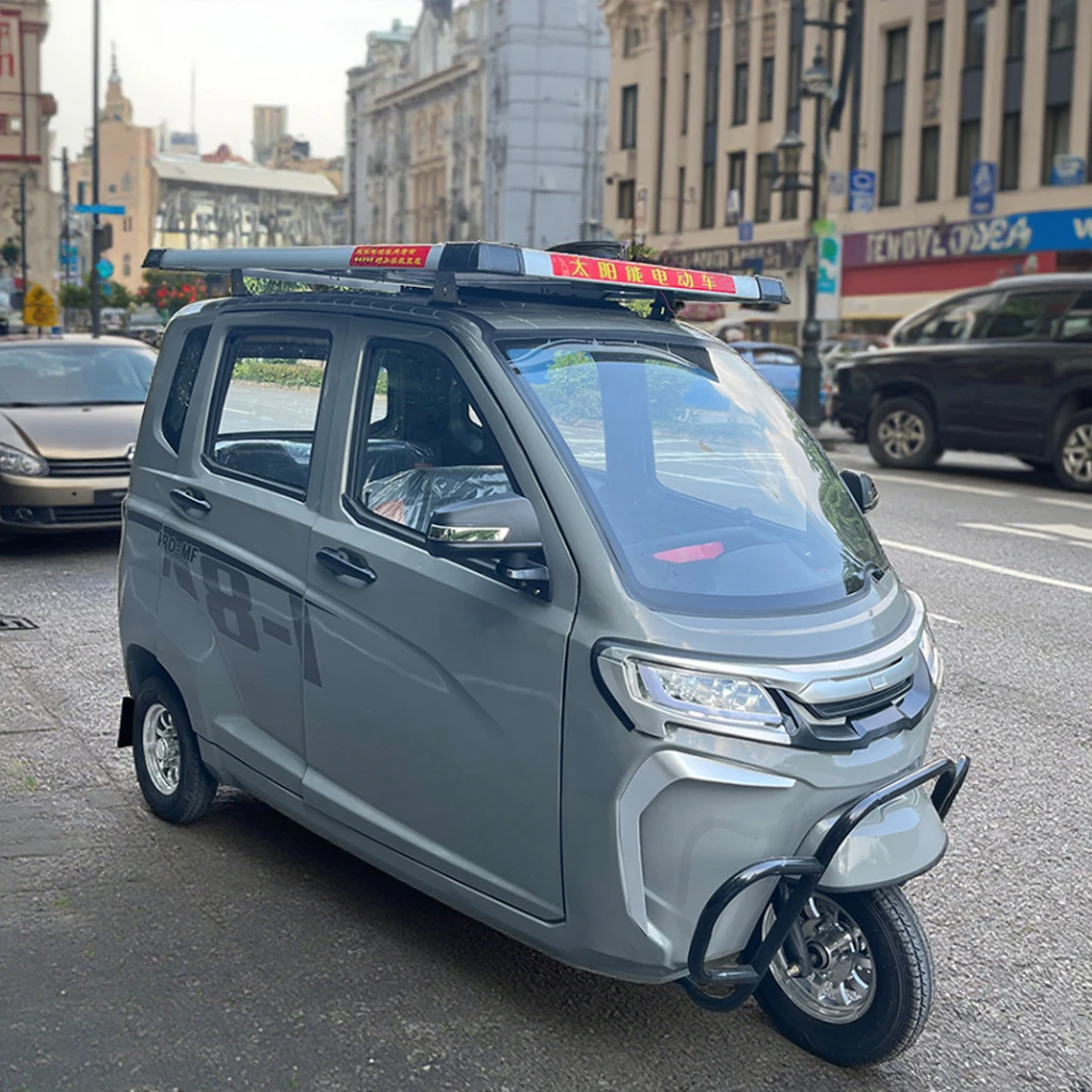 2025 China three wheels electric tricycle auto rickshaw luxurious New energy solar electric 5 passengers enclosed tricycle