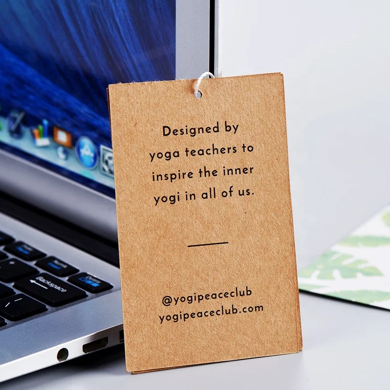 Chinese paper product factory Free design low MOQ printing logo kraft paper clothes hang tag clothing label