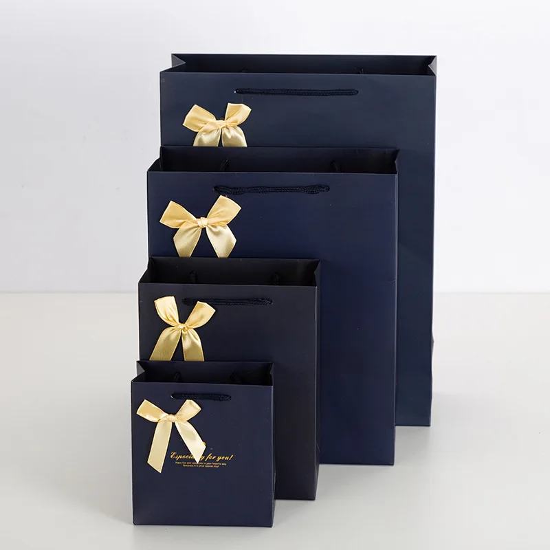 Custom size personalized different types clothing paper bags with satin ribbon, prime branded packing paper bag