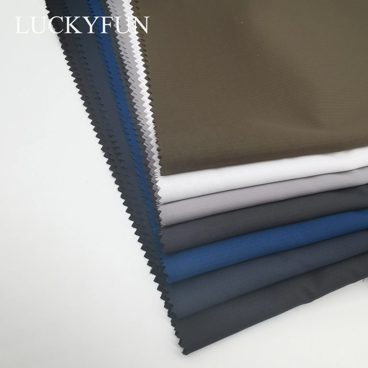 100% POLYESTER SANTANA BONDING  PONGEE  FABRIC FOR  WINTER JACKET