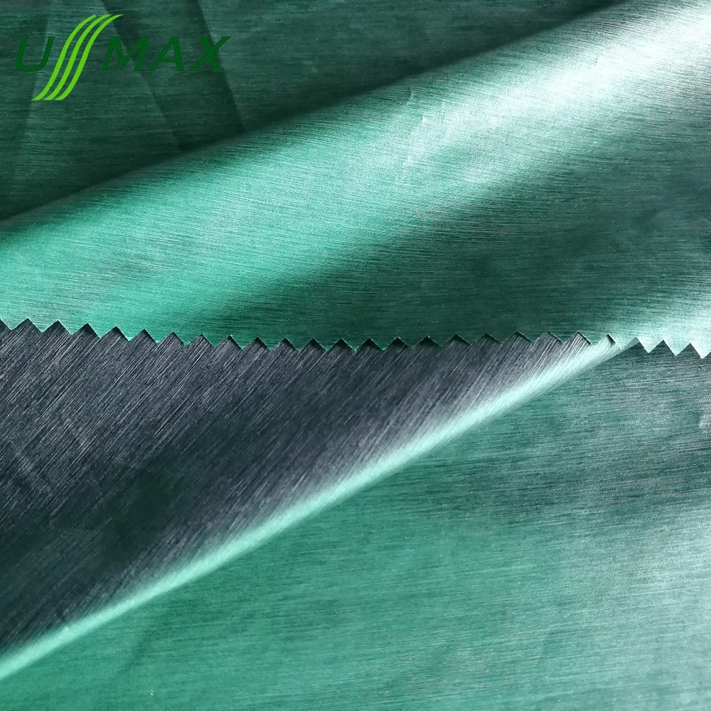 
20d Nylon polyester two color tones shiny taffeta calendering fabric for down proof jackets wears 